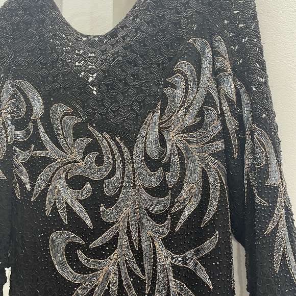 Too small and zipper broken - Picture 12 of 13